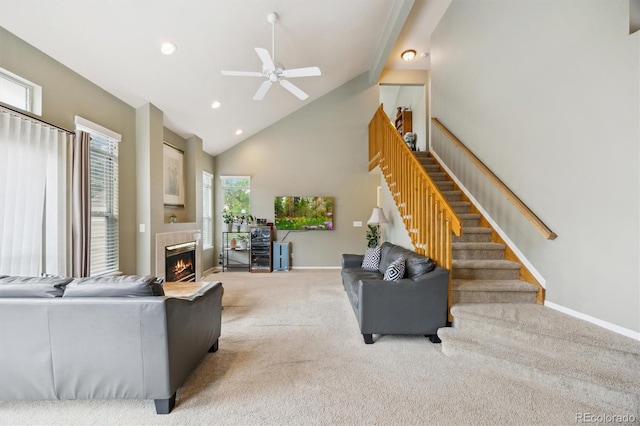 2164 S Troy Way, Aurora, CO 80014 - living room featuring carpet, stairway, a ceiling fan, a fireplace, and baseboards