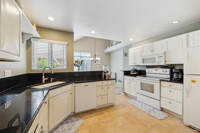 2164 S Troy Way, Aurora, CO 80014 - kitchen with white appliances, a sink, dark countertops, a chandelier, and recessed lighting