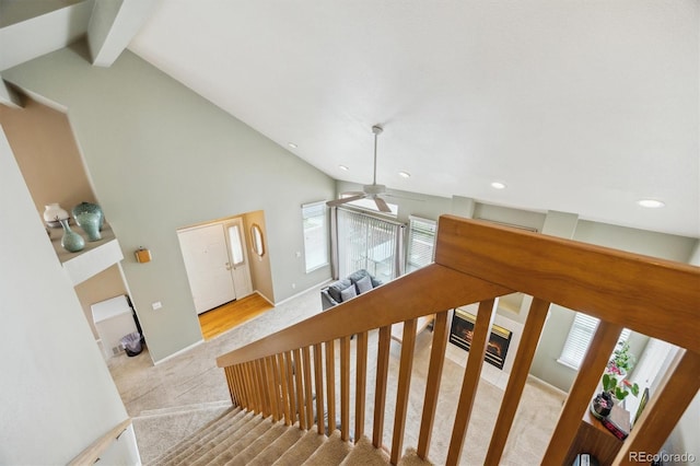 2164 S Troy Way, Aurora, CO 80014 - stairway with recessed lighting, beamed ceiling, high vaulted ceiling, carpet floors, and a ceiling fan