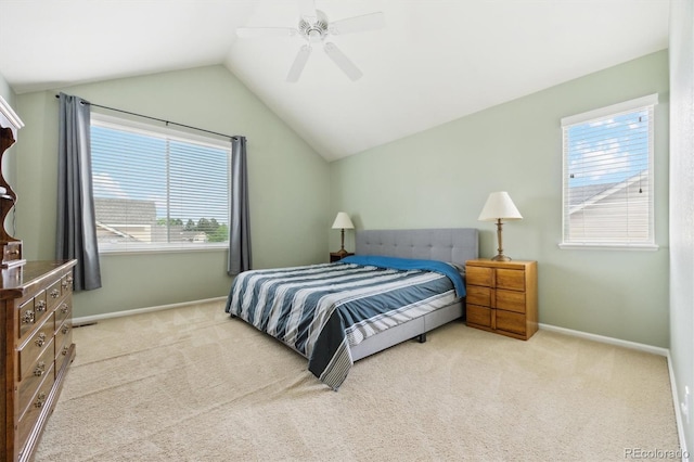 2164 S Troy Way, Aurora, CO 80014 - carpeted bedroom with multiple windows, vaulted ceiling, baseboards, and ceiling fan