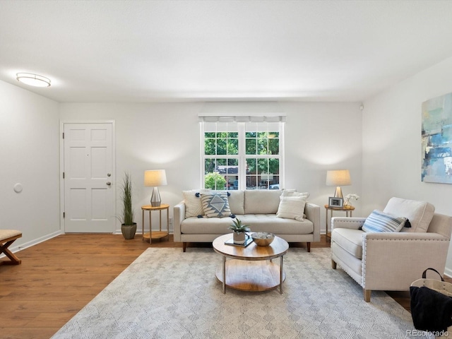 1067 E 15th Ave, Broomfield, CO 80020 - living room featuring wood finished floors and baseboards