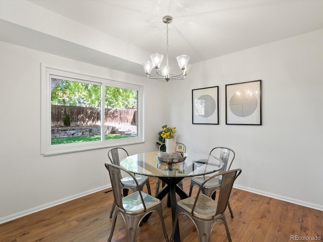 1067 E 15th Ave, Broomfield, CO 80020 - dining area featuring a chandelier and hardwood / wood-style floors