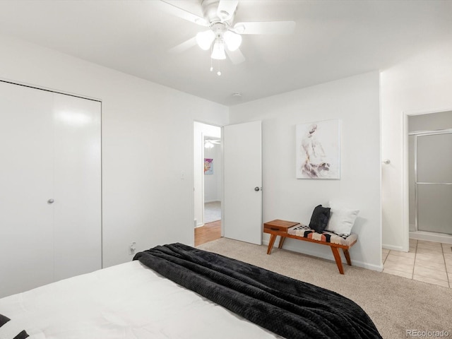 1067 E 15th Ave, Broomfield, CO 80020 - bedroom with light colored carpet, ceiling fan, and a closet