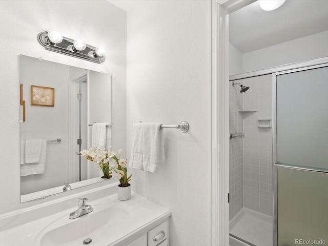 1067 E 15th Ave, Broomfield, CO 80020 - full bath featuring vanity and a stall shower