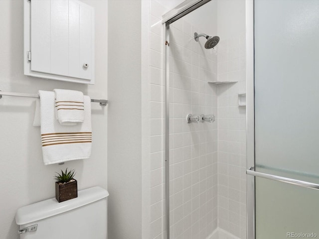 1067 E 15th Ave, Broomfield, CO 80020 - full bathroom featuring toilet and a stall shower