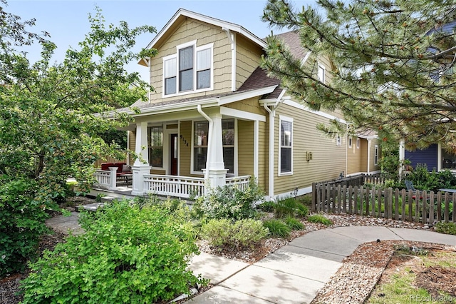 9134 E 29th Pl, Denver, CO 80238 - view of front of property with a porch and a shingled roof