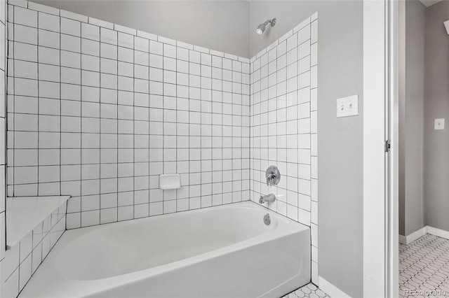 9134 E 29th Pl, Denver, CO 80238 - full bath featuring baseboards, shower / bathtub combination, and tile patterned flooring