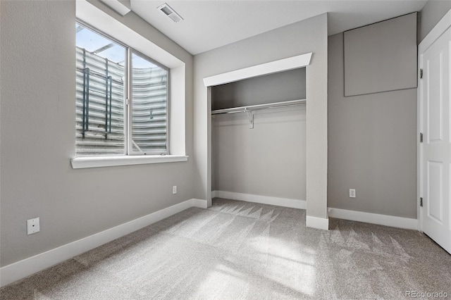 9134 E 29th Pl, Denver, CO 80238 - unfurnished bedroom with carpet, a closet, and baseboards