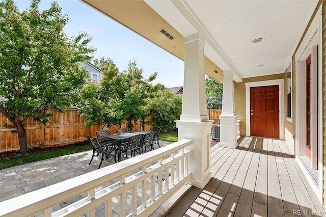 9134 E 29th Pl, Denver, CO 80238 - wooden terrace featuring outdoor dining space