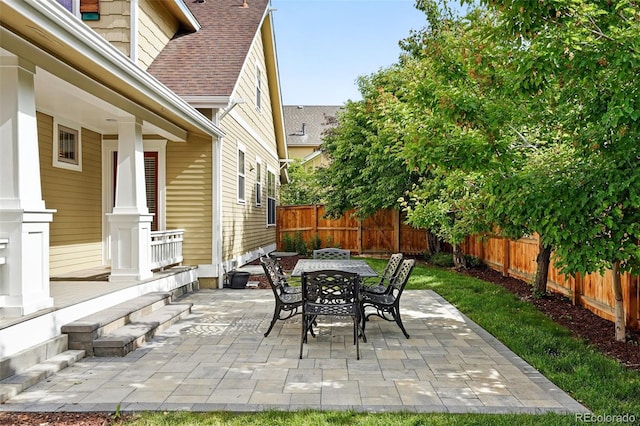 9134 E 29th Pl, Denver, CO 80238 - fenced backyard featuring outdoor dining space and a patio area