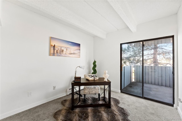 office with beamed ceiling, baseboard heating, carpet, and a textured ceiling