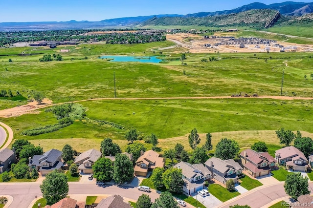 12534 W Hoover Ave, Littleton, CO 80127 - aerial view of residential area featuring a water and mountain view