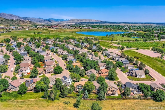 12534 W Hoover Ave, Littleton, CO 80127 - aerial perspective of suburban area with a water and mountain view