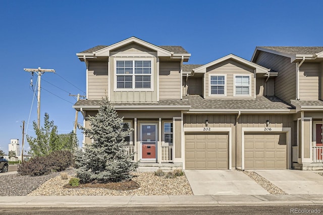 202 Ash St, Bennett, CO 80102 - multi unit property featuring board and batten siding, a garage, concrete driveway, and a shingled roof