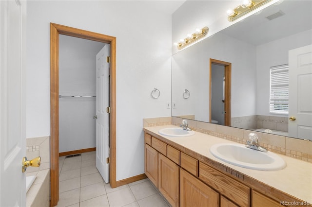 34771 E 153rd Ct, Hudson, CO 80642 - full bathroom with double vanity, a garden tub, and tile patterned flooring