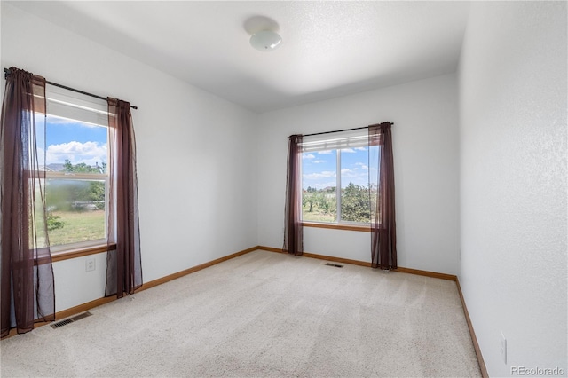 34771 E 153rd Ct, Hudson, CO 80642 - empty room with plenty of natural light and carpet floors