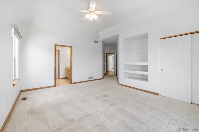 34771 E 153rd Ct, Hudson, CO 80642 - unfurnished bedroom featuring light colored carpet, a closet, a ceiling fan, and ensuite bathroom