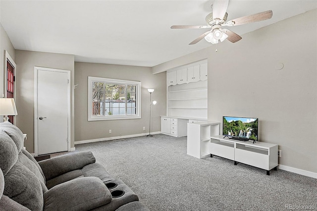 825 Hill Road Ct, Colorado Springs, CO 80909 - living room with a ceiling fan, carpet flooring, and baseboards
