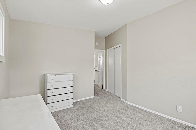 825 Hill Road Ct, Colorado Springs, CO 80909 - unfurnished bedroom featuring carpet, baseboards, and a closet