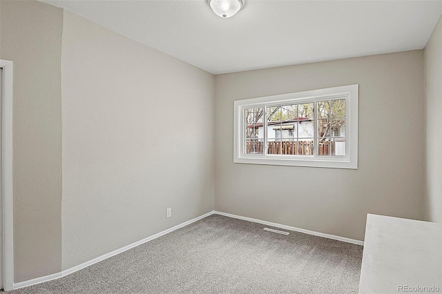 825 Hill Road Ct, Colorado Springs, CO 80909 - carpeted empty room with baseboards