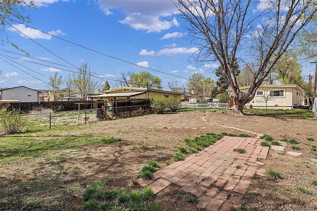 825 Hill Road Ct, Colorado Springs, CO 80909 - view of fenced backyard