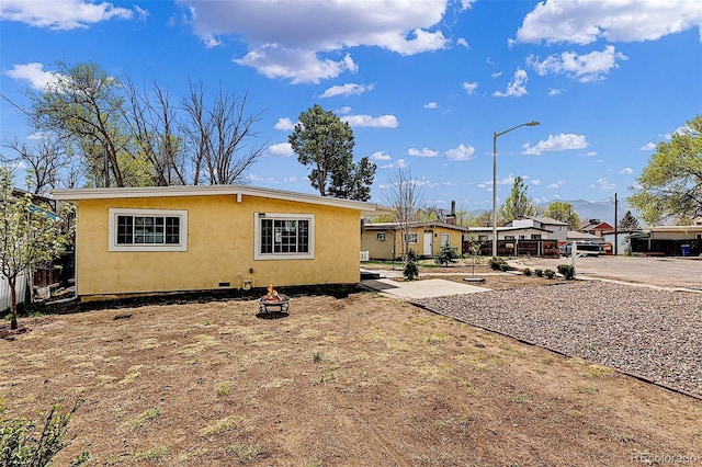 825 Hill Road Ct, Colorado Springs, CO 80909 - view of front of home with stucco siding