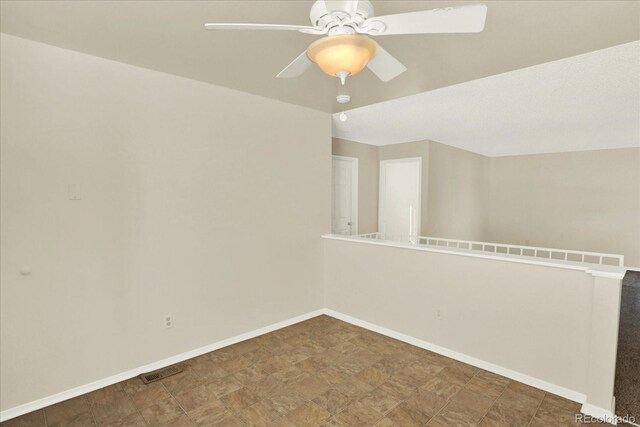 spare room featuring ceiling fan