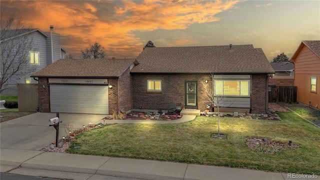 view of front facade featuring concrete driveway, brick siding, a garage, and a shingled roof