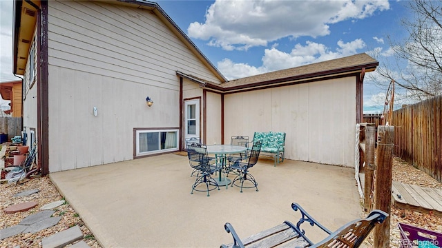 view of patio / terrace featuring fence and outdoor dining space