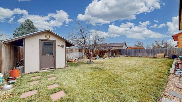 view of yard with a storage unit and an outdoor structure