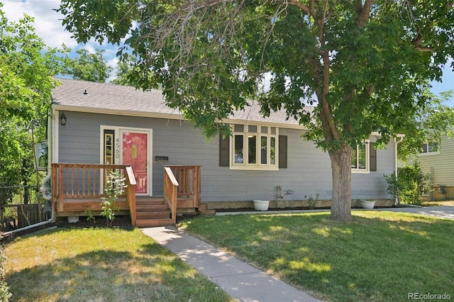 4560 S Fox St, Englewood, CO 80110 - ranch-style home with roof with shingles and a deck