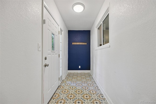 4560 S Fox St, Englewood, CO 80110 - doorway featuring baseboards