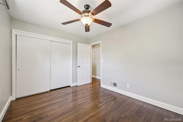4560 S Fox St, Englewood, CO 80110 - unfurnished bedroom with wood finished floors, a closet, and ceiling fan