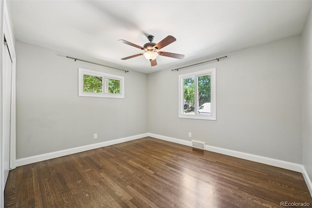 4560 S Fox St, Englewood, CO 80110 - empty room featuring healthy amount of natural light, ceiling fan, and wood finished floors