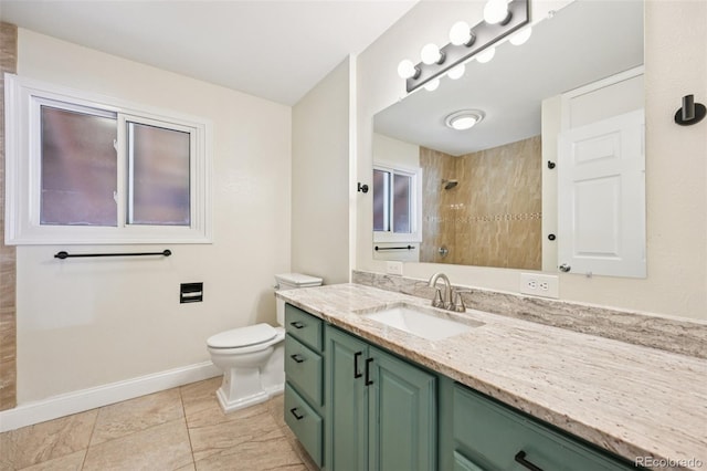 4560 S Fox St, Englewood, CO 80110 - full bathroom featuring a tile shower, vanity, and tile patterned floors