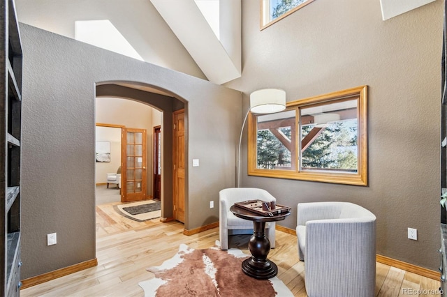 sitting room with light hardwood / wood-style flooring