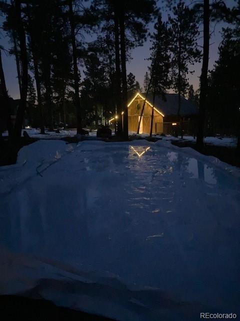 view of snow covered pool