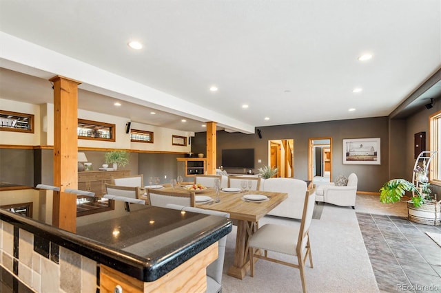 kitchen featuring a center island and ornate columns