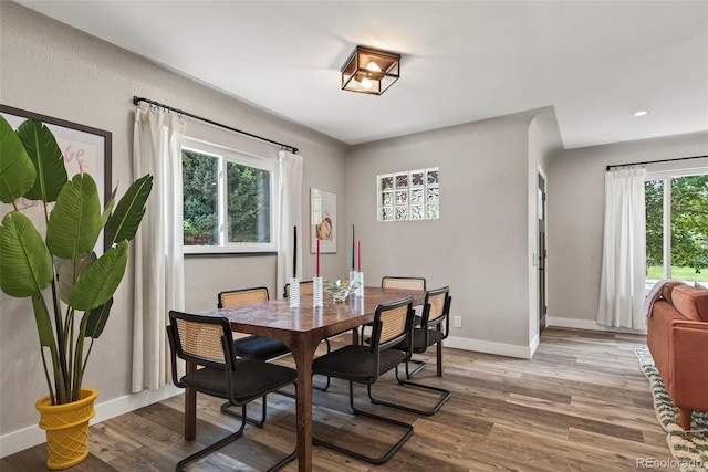 2050 S Wolff St, Denver, CO 80219 - dining area with light wood-style floors and recessed lighting