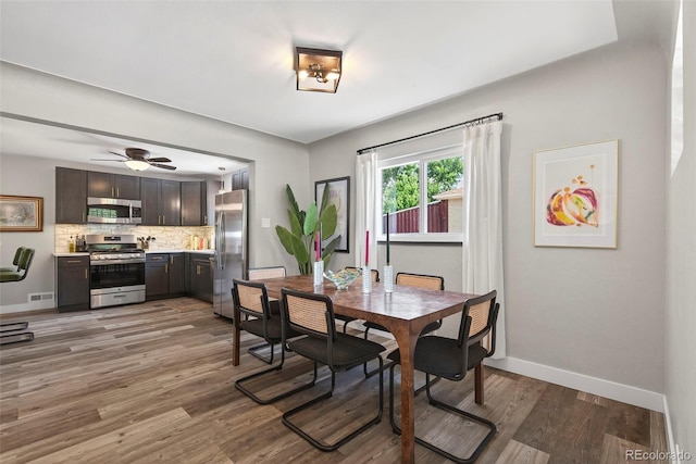 2050 S Wolff St, Denver, CO 80219 - dining space with light wood-style flooring and a ceiling fan