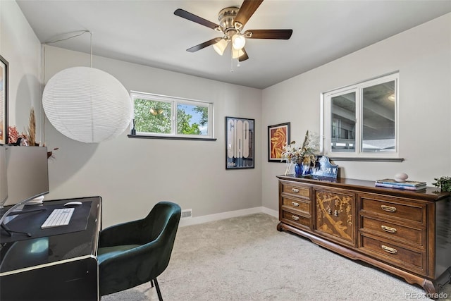 2050 S Wolff St, Denver, CO 80219 - home office with light colored carpet and ceiling fan