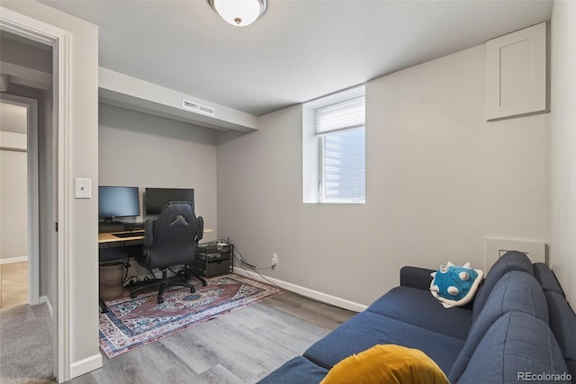 2050 S Wolff St, Denver, CO 80219 - office with baseboards and wood finished floors