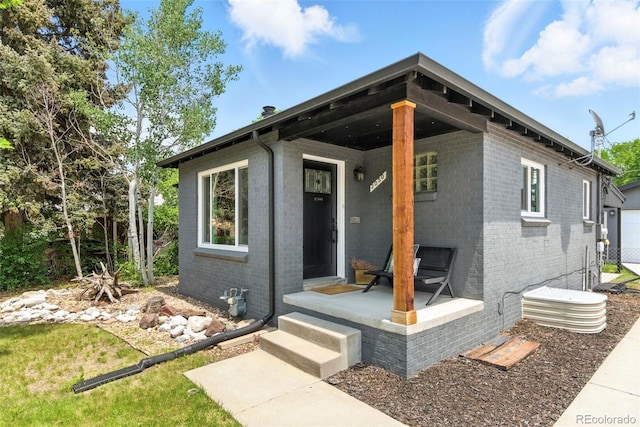 2050 S Wolff St, Denver, CO 80219 - view of front of home with brick siding