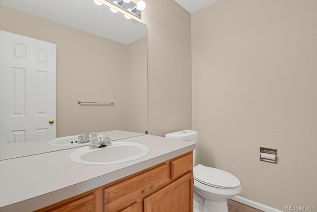 9874 Grove St Unit B, Westminster, CO 80031 - half bathroom with vanity and tile patterned floors