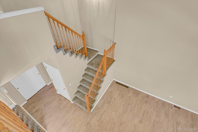 9874 Grove St Unit B, Westminster, CO 80031 - stairway with wood finished floors and baseboards