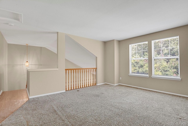 9874 Grove St Unit B, Westminster, CO 80031 - spare room with carpet floors and vaulted ceiling