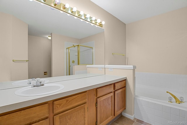 9874 Grove St Unit B, Westminster, CO 80031 - bathroom featuring a stall shower, vanity, a garden tub, and tile patterned flooring