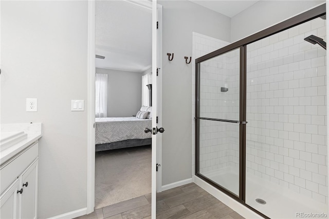 bathroom with vanity and walk in shower