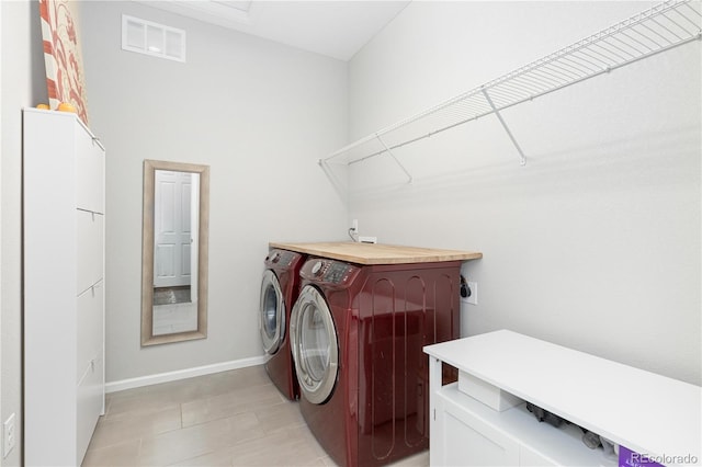 laundry area featuring separate washer and dryer