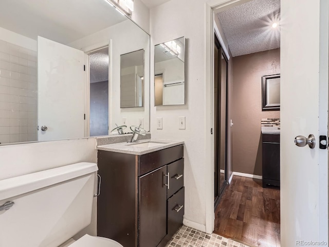 1990 S Helena St Unit H, Aurora, CO 80013 - bathroom with vanity and wood finished floors